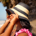 NONA Striped Bucket Palm Straw Hat In Black and Natural