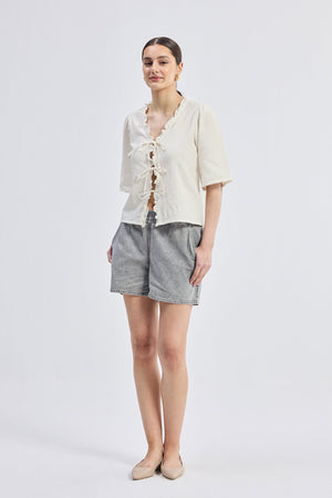 Relaxed Fit Top With Ruffles and Front-Ties in Cream