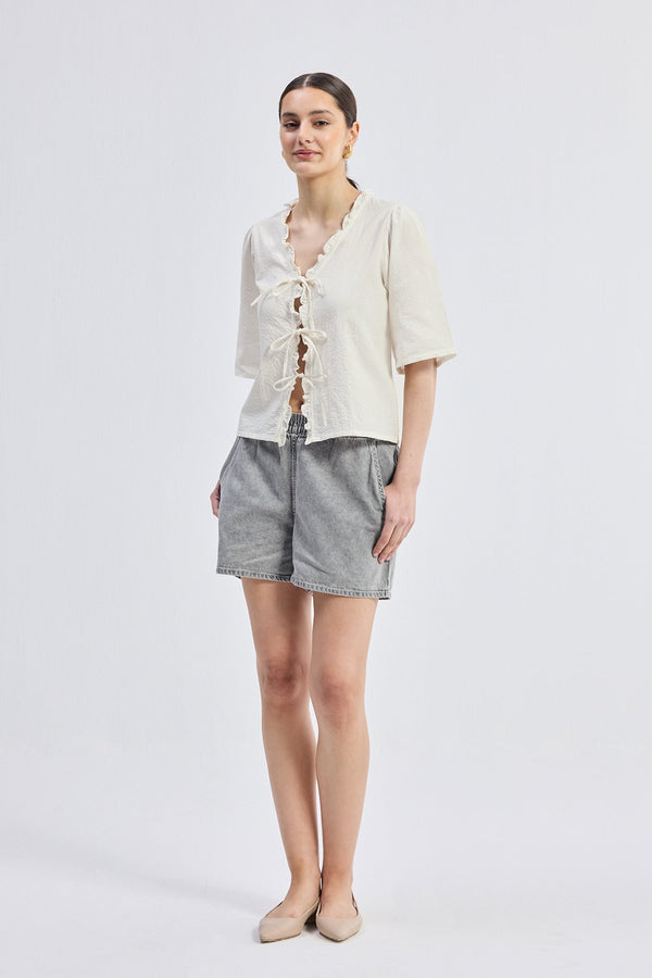 Relaxed Fit Top With Ruffles and Front-Ties in Cream
