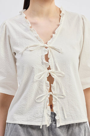 Relaxed Fit Top With Ruffles and Front-Ties in Cream