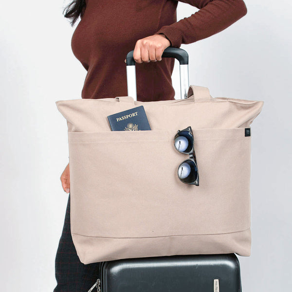 Tote bags with trolley sleeve