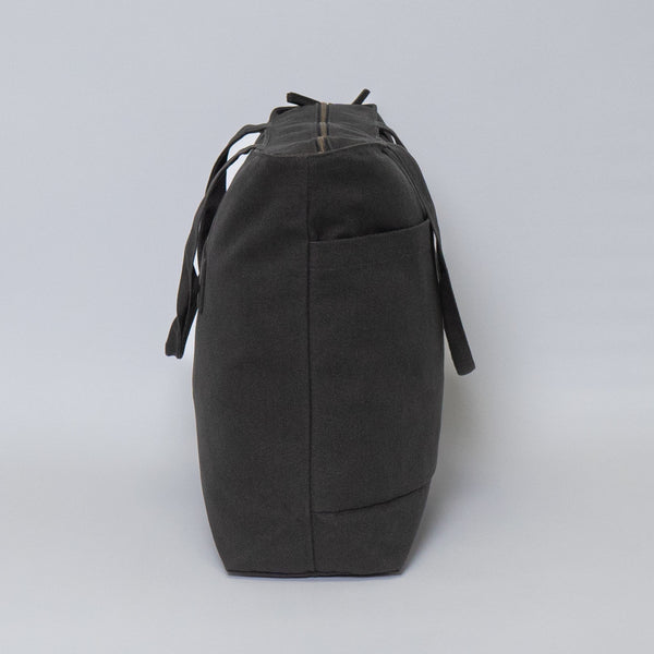 Tote bags with trolley sleeve